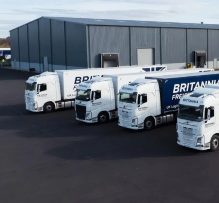 Line-up of modern PIP’S TRANSPORT LTD trucks in a transport yard